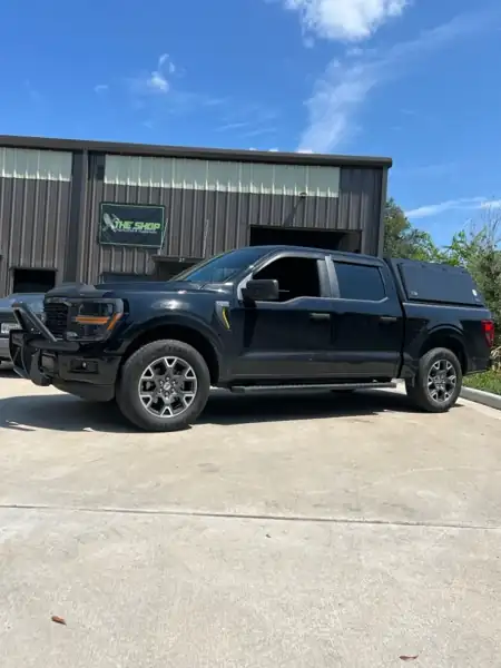 Ford F-150 outside The Shop Fabrication & Suspension in Houston