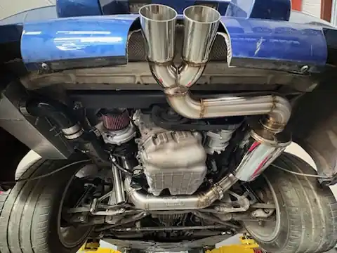 Custom stainless dual exhaust fabricated by The Shop